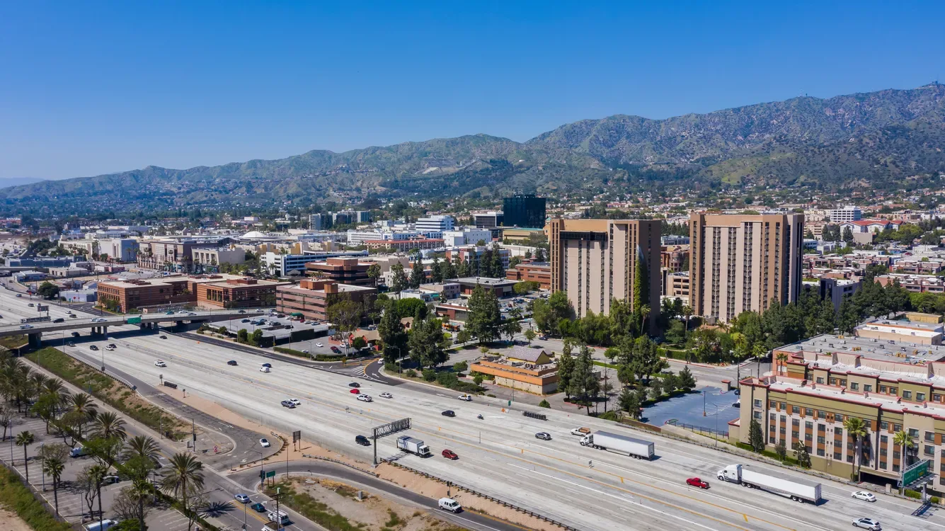 Aerial view of commercial buildings and the freeway in Burbank, California
